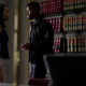Zaya and Malcolm having a tense conversation.